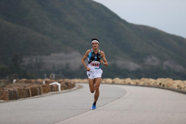 Total Health team member competing in a running race