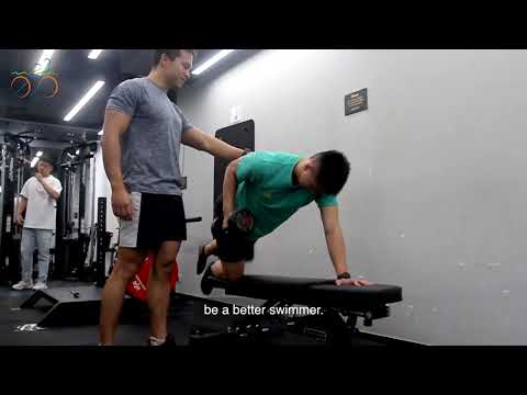 Client testimonial video thumbnail — rehabilitation exercise in the gym
