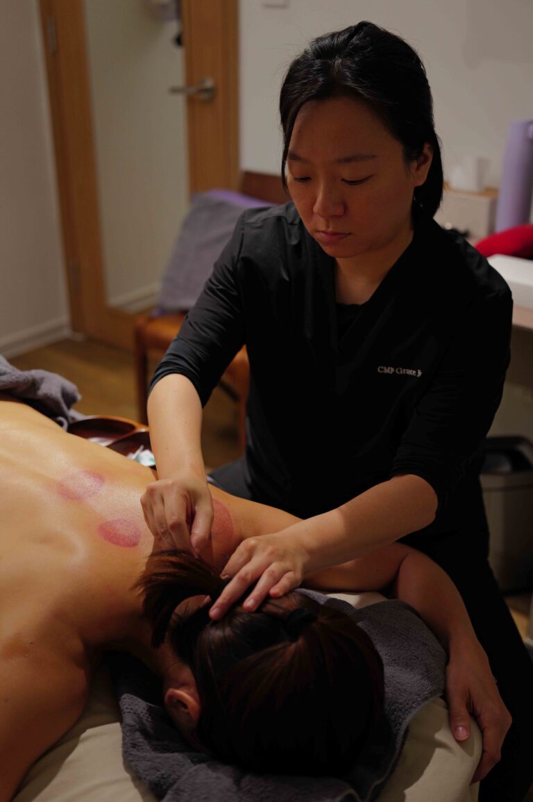 Therapist treating a patient's knee